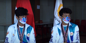 PAPUA MENUJU JEJAK PRESTASI – Akbar A. Lubis & Nakami V. Makarim (Medali Emas Cabor Bermotor Kategori MX 125 cc Beregu PON XX Papua)