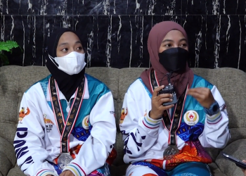 PAPUA MENUJU JEJAK PRESTASI – Devi Sutanti & Miftiyah Husnul Khoiriyah (Medali Perak Cabor Pencak Silat Kelas Seni Ganda PON XX Papua)